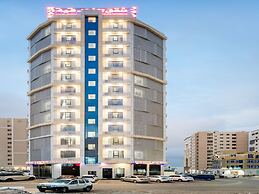 OYO Townhouse 156 Rose Hotel Apartments.