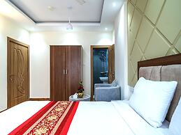 OYO Townhouse 156 Rose Hotel Apartments.