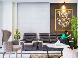 OYO Townhouse 156 Rose Hotel Apartments.