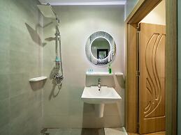 OYO Townhouse 156 Rose Hotel Apartments.