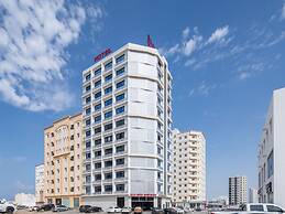 OYO Townhouse 156 Rose Hotel Apartments.