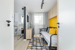 Yellow and Grey Studio by Renters