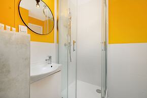 Yellow and Grey Studio by Renters