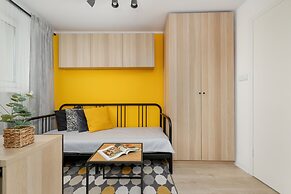 Yellow and Grey Studio by Renters