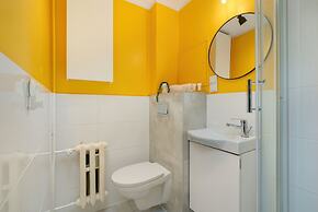 Yellow and Grey Studio by Renters