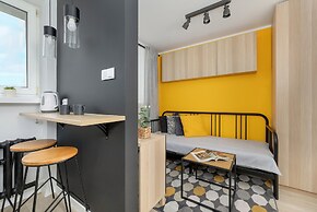 Yellow and Grey Studio by Renters