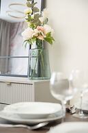 Zielińskiego Apartment by Renters