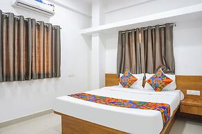 Fabhotel White House Inn