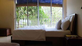 Whispering Pines Hotel & Residences