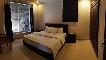 Whispering Pines Hotel & Residences