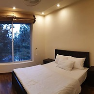 Whispering Pines Hotel & Residences