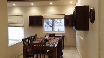 Whispering Pines Hotel & Residences