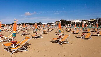 Enjoy the Beach Breeze in our Colorful Flat