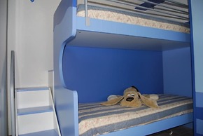 Enjoy the Beach Breeze in our Colorful Flat