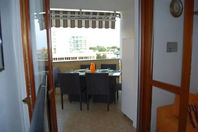 Enjoy the Beach Breeze in our Colorful Flat