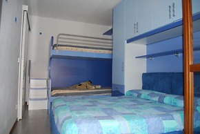 Enjoy the Beach Breeze in our Colorful Flat