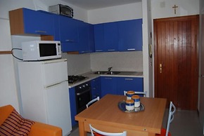 Enjoy the Beach Breeze in our Colorful Flat