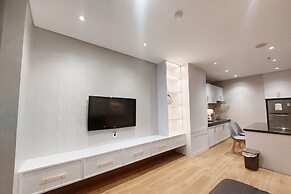 Brand New and Nice 2BR Apartment at The Reiz Condominium Medan By Trav