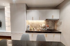 Brand New and Nice 2BR Apartment at The Reiz Condominium Medan By Trav