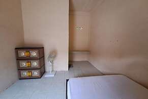 SPOT ON 93465 Archa Guest House Syariah