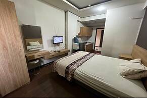 OYO 93424 Apartemen The Suite Metro By Salman
