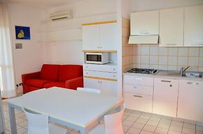 Experience the Beach Breeze in our Bright Flat