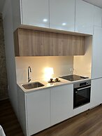 D. Maria Apartments