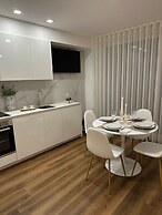 D. Maria Apartments