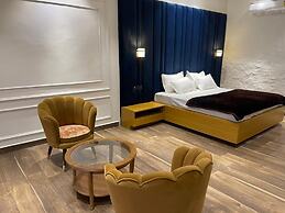 Mangalam Inn By AAA Grand