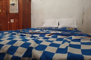 SPOT ON 93460 Lewi Family Guest House Near GBKP Bangun Mulia Km. 11