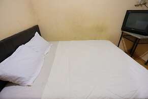 SPOT ON 93460 Lewi Family Guest House Near GBKP Bangun Mulia Km. 11