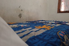 SPOT ON 93460 Lewi Family Guest House Near GBKP Bangun Mulia Km. 11