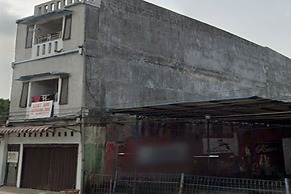 SPOT ON 93460 Lewi Family Guest House Near GBKP Bangun Mulia Km. 11