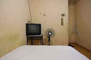 SPOT ON 93460 Lewi Family Guest House Near GBKP Bangun Mulia Km. 11