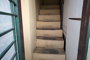 SPOT ON 93460 Lewi Family Guest House Near GBKP Bangun Mulia Km. 11