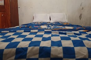 SPOT ON 93460 Lewi Family Guest House Near GBKP Bangun Mulia Km. 11