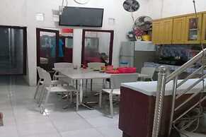 SPOT ON 93460 Lewi Family Guest House Near GBKP Bangun Mulia Km. 11