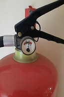 SPOT ON 93460 Lewi Family Guest House Near GBKP Bangun Mulia Km. 11