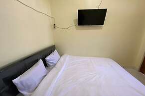 SPOT ON 93452 Wulan Homestay 2  Syariah