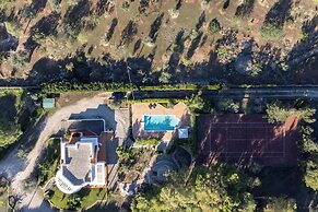 Villa Menhir with pool garden and tennis