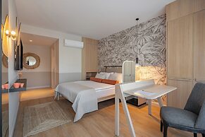 Oli Hotel And Suites