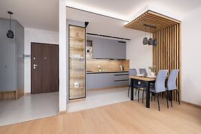 Dark Blue Apartment in Kraków by Renters