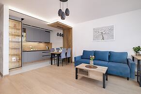 Dark Blue Apartment in Kraków by Renters