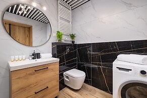 Dark Blue Apartment in Kraków by Renters