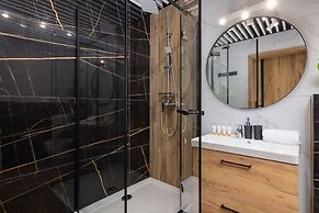 Dark Blue Apartment in Kraków by Renters