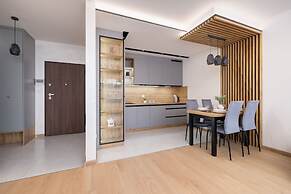 Dark Blue Apartment in Kraków by Renters