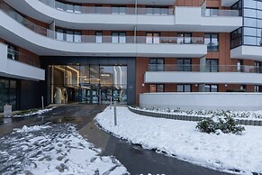 Dark Blue Apartment in Kraków by Renters