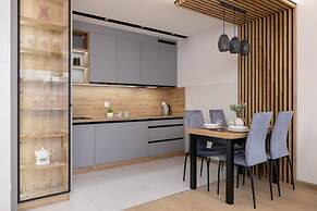 Dark Blue Apartment in Kraków by Renters