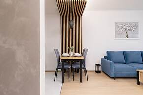 Dark Blue Apartment in Kraków by Renters