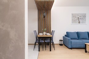 Dark Blue Apartment in Kraków by Renters